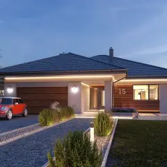 Nowoczesny ariel projekt domu z garażem, oświetlony wieczorem. Obok czerwony mini cooper.