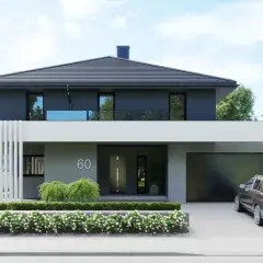 Nowoczesny projekt domu piętrowego z garażem i przestronnym tarasem. Elegancka bryła, duże okna i zadbany ogród.