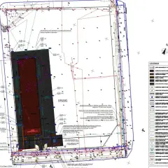Mapa geodezyjna z naniesionymi elementami infrastruktury. Zastanawiasz się, ile bierze geodeta za wytyczenie działki? Ten dokument to podstawa do takich obliczeń.
