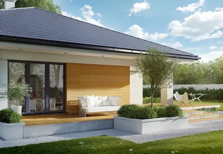 Nowoczesny taras z sofą i stolikiem, idealny do relaksu w ogrodzie. Projekt "Ariel 4" zachwyca prostotą i elegancją.