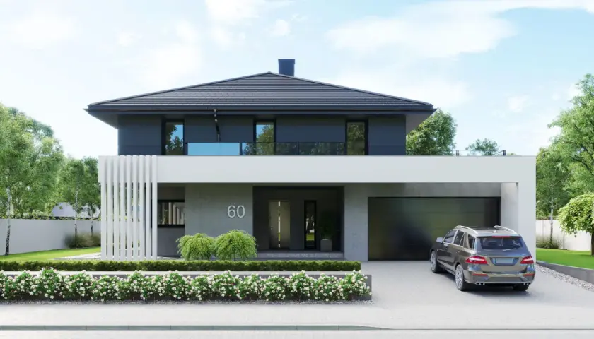 Nowoczesny projekt domu piętrowego z garażem i przestronnym tarasem. Elegancka bryła, duże okna i zadbany ogród.