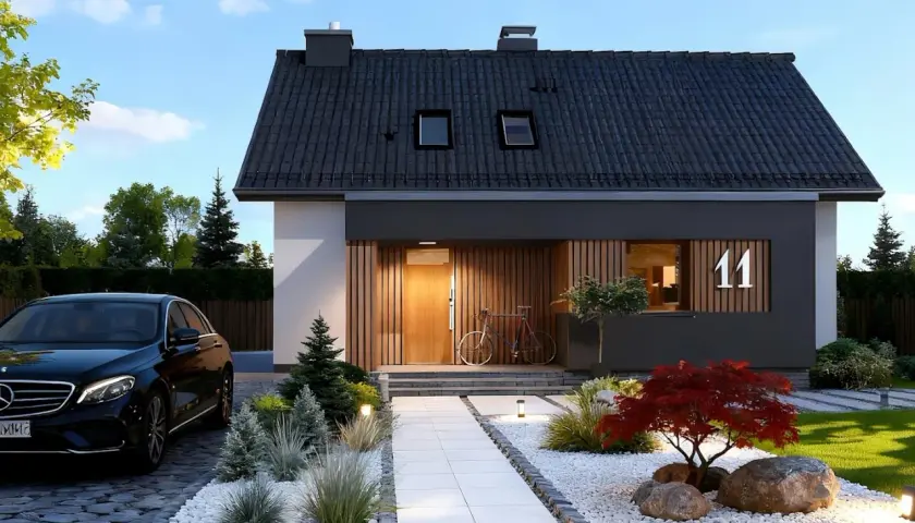 Nowoczesny dom z podjazdem, czarnym Mercedesem i rowerem przy drzwiach. Projekt domidea 60 dg.